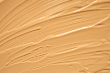 Fototapeta na wymiar liquid foundation makeup cream texture background