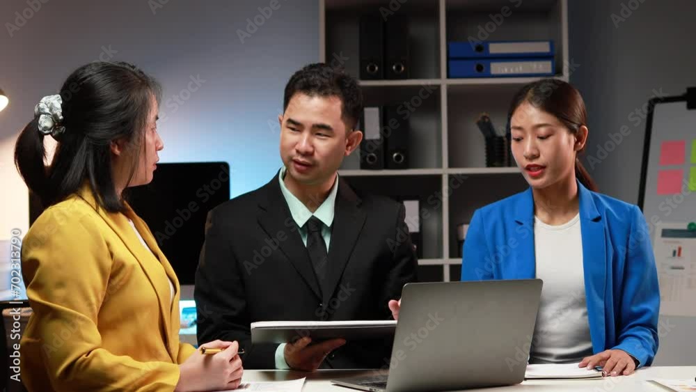 Wall mural Atmosphere of a startup company meeting, business people are meeting together to summarize and plan investment finances, they are the founders of the company. Business administration concept.