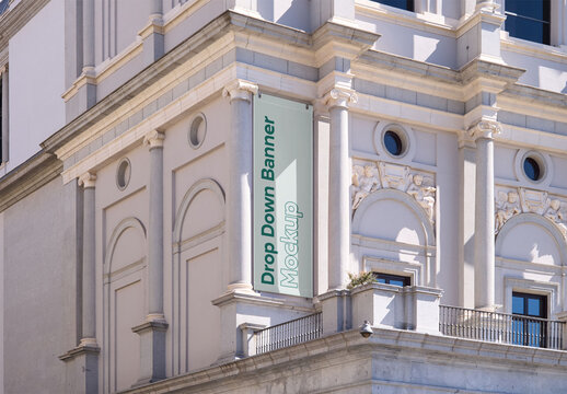 Mockup of customizable banner hanging outside building