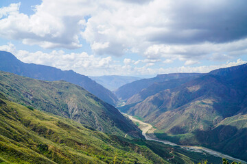 Fototapeta na wymiar SANTANDER, COLOMBIA; December 31 2023: Landscape of the chicamocha Canyon and the Santandereanidad Monument in Chicamocha National Park