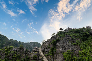 Fototapeta na wymiar Ninh Binh landscpae in Vietnam. Mua Cave area scenery with karst mountains