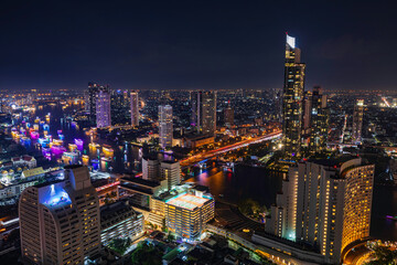 Fototapeta na wymiar Beautiful cityscape Bangkok river boat business district and residential. In the twilight,