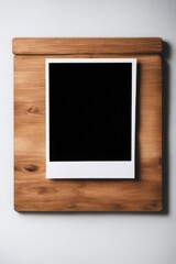 Mockup of Polaroid frame on wooden background