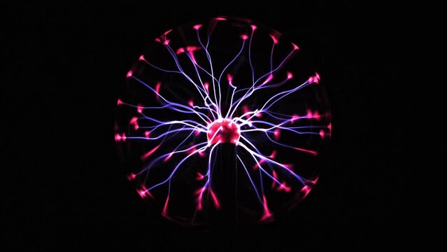 Electric Elegance: Plasma Ball Illuminated by Stormy Lightning Effects