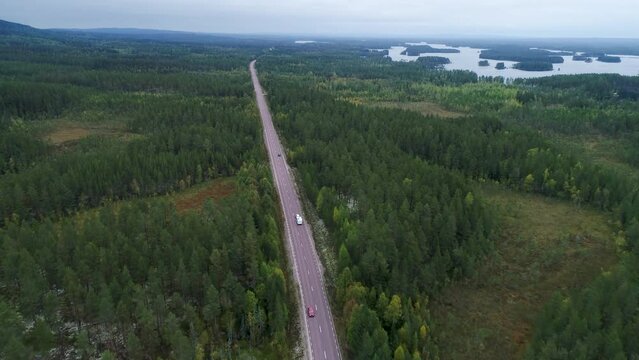 Caravan Camping driving on E45 Higway Road through the wilderness of middle Sweden between the towns of Malung and Oje