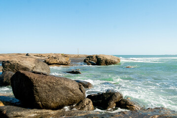 Fototapeta na wymiar Sea with rocks and blue sky