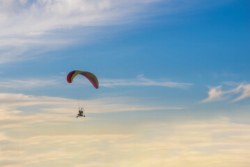 Paramotor glider in the sky