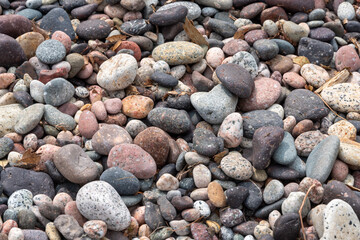 Abstract panel of pebbled beach as texture or background