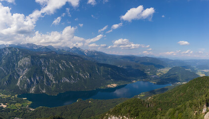 Fototapeta na wymiar Lake Bohinj a large lake in Slovenia, is located in the Bohinj Valley of the Julian Alps, in the northwestern region of Upper Carniola, part of the Triglav National Park