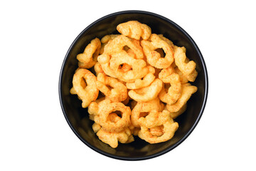 Bowl of chips. Corn chips with spices. Black round bowl isolated on white. Shaped chips background. Pile of party snacks. Flat lay top view.
