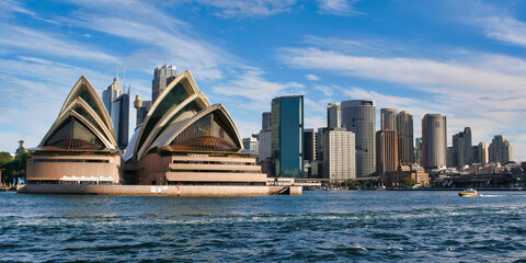 Vibrant Sydney Cityscape at Sunset: Iconic Harbour and Landmarks