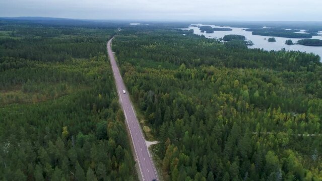Caravan Camping driving on E45 Higway Road through the wilderness of middle Sweden between the towns of Malung and Oje