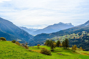 Fototapeta na wymiar Village of Lansch / Lenz in the Canton Graubünden, view toward Sozas, Switzerland