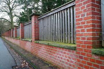 Wall of red clinker bricks to border a monastery cemetery. Hanover Marienwerder, Lower Saxony,...