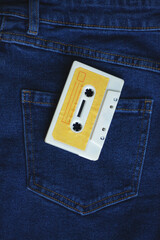 classic new clean cassettes in different colors on a jeans background