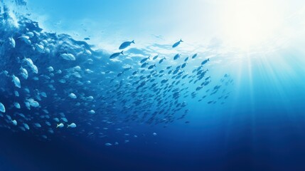 underwater marine ecosystem A school of large fish on a blue background. - obrazy, fototapety, plakaty