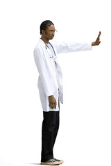 A male doctor, on a white background, in full height, shows a stop sign