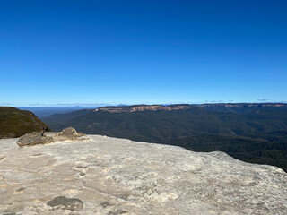 Spectacular views from a mountain-top lookout. Blue mountains, Australia, NSW. Beautiful rock formation. White stone at the summit.