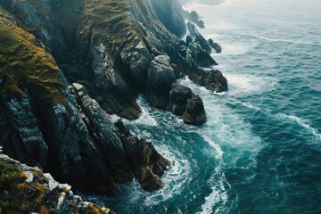 A rugged cape juts out from the rocky cliffs, standing tall against the crashing waves of the bight...