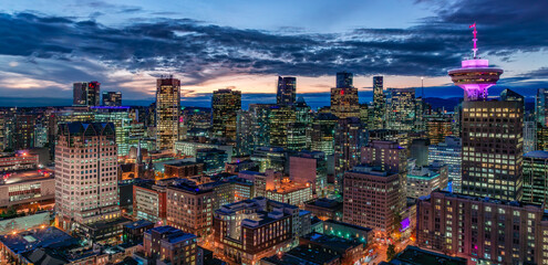 Downtown Vancouver Cityscape. Nightime after sunset. Aerial.