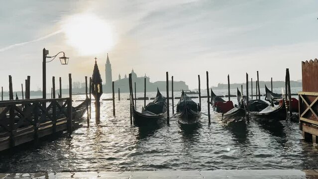 Parking gandolas on the Doge's palace embankment in the pier