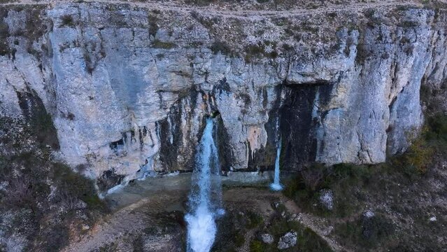 Aerial view from a drone of Yeguamea waterfall. LAS LORAS GEOPARK. UNESCO. Fuenteodra. Municipality of Humada. Burgos province. Castile and Leon. Spain. Europe