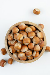 Hazelnuts in a wooden plate
