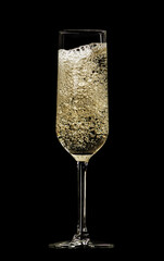 full champagne glass on black background