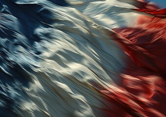 An abstract photograph of a blurred French flag in motion, capturing a sense of energy and dynamism. - obrazy, fototapety, plakaty