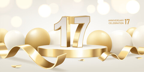 17th Anniversary celebration background. Golden 3D numbers on round podium with golden ribbons and balloons with bokeh lights in background.