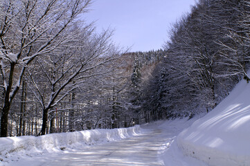 Slippery frozen road in the winter mountain.
