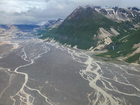Ukak River drains off the ash field of Valley of Ten Thousand Smokes in Katmai National Park and Preserve. Braided river is rich with ash deposits from 1912 Novarupta volcano eruption. 