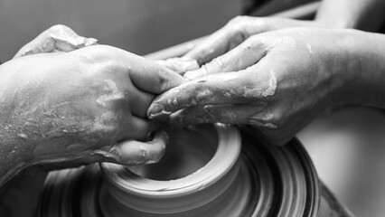Black and white photo, clay, ceramics or hands in a design workshop working on an artistic cup or mug in a small business studio. Makes crafts in sculpture