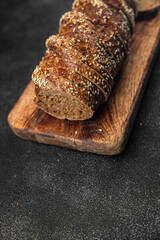 bread Rye baked slice sunflower seed fresh goods food healthy fresh cooking appetizer meal food snack on the table copy space food background rustic top view