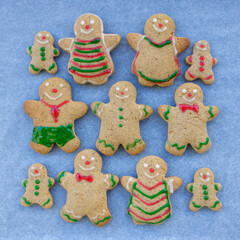Flat lay homemade gingerbread men, women and children
