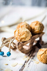 Studio shot of gluten free almond cookies on miniature sled