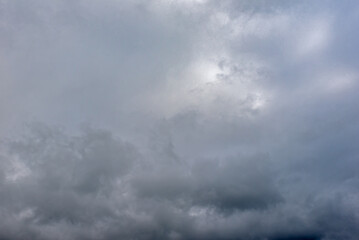 Naklejka na ściany i meble The background of the cloudy sky before the storm