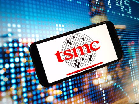 Konskie, Poland - January 03, 2024: TSMC Taiwan Semiconductor Manufacturing Company logo displayed on mobile phone screen