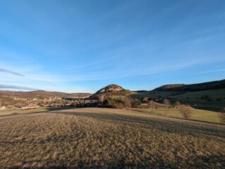 View to Allands iconic mountain: Buchberg. Idyllic landscape with blue sky in Alland, Lower Austria