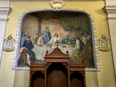 Hrubieszow, Poland, September 4, 2023: Sanctuary of Our Lady of Consolation, Sokalska in Hrubieszów, Poland. Fragment of the interior, fresco "The Last Supper" and confessional