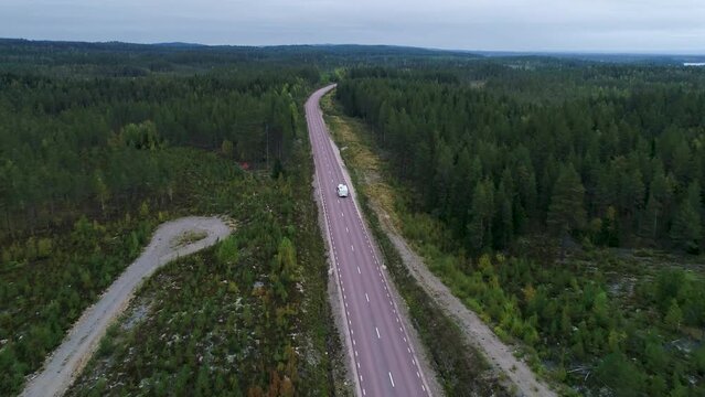 Caran Camping driving on E45 Higway Road through the wilderness of middle Sweden between the towns of Malung and Oje