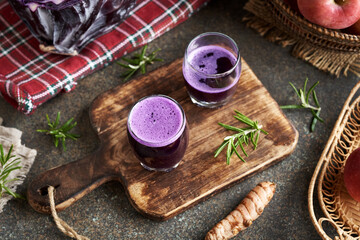 Purple cabbage juice in two glass cups