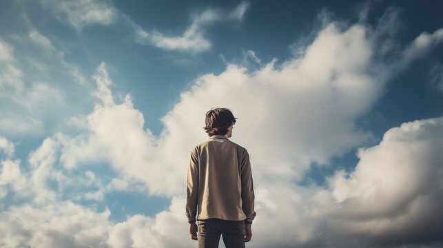 Man looking up at the sky
