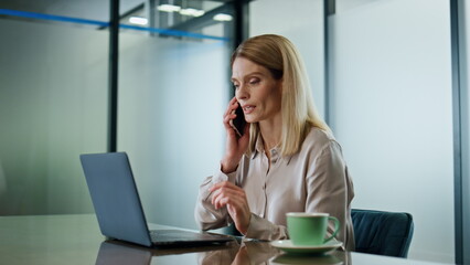 Positive director making call office. Excited winner lady reacting emotionally