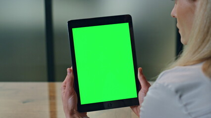 Greenscreen pad woman hands holding at office close up. Lady watching computer