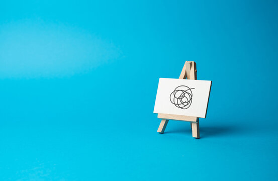 Easel sign with causeless doodles on a blue background. Nonsense is not worth your time and attention. Failed advertising campaign. Cut the nonsense. Go through difficulties and challenges.
