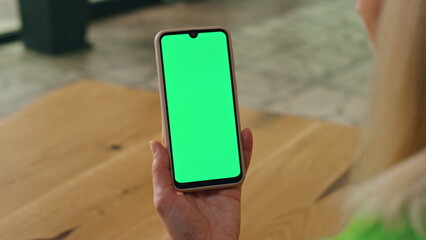 Executive finger touching greenscreen telephone at office. Woman swiping phone