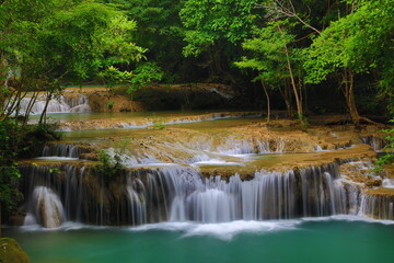 Erawan Waterfall is located in Erawan National Park. A 7-tiered waterfall for each level can go into the water. It is very famous, large and beautiful. 
Kanchanaburi province,Thailand