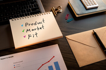 There is notebook with the word Product Market Fit. It is as an eye-catching image.