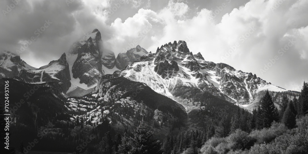 Poster a black and white photo of a mountain range. suitable for various uses